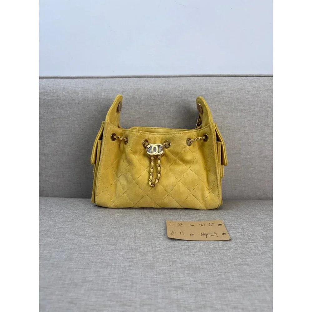 CHANEL Yellow Calfskin Drawstring Bucket Bag Mini GHW